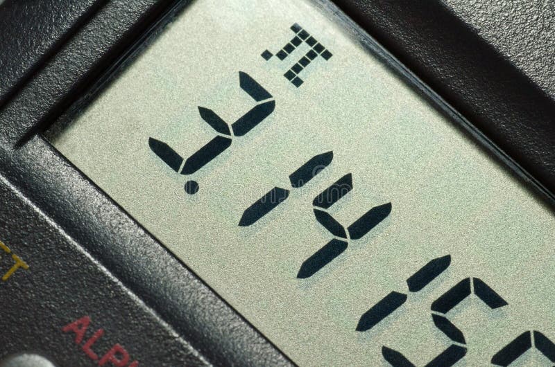 Pi number on calculator's LCD. Close-up shot. Pi number on calculator's LCD. Close-up shot.