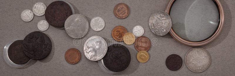 Numismatics. Old Collectible Coins of Silver, Gold and Copper on the