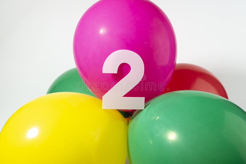 Number 2 and colourful round balloons. Birthday, anniversary, jubilee concept. For invitation, greetings or decoration cards. Number 2 and colourful round balloons. Birthday, anniversary, jubilee concept. For invitation, greetings or decoration cards.