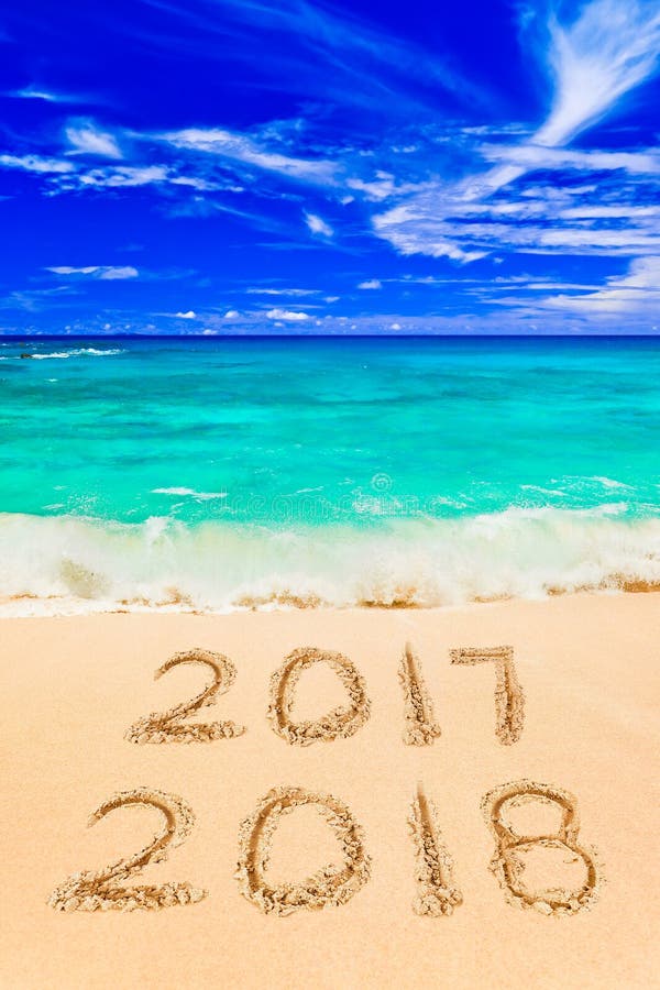 Numbers 2018 on beach - concept holiday background. Numbers 2018 on beach - concept holiday background