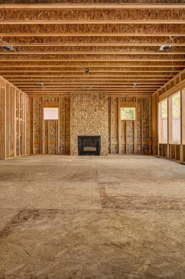 Nuova casa della costruzione del legno interna della struttura immagine stock libera da diritti Nuova casa della costruzione del legno interna della struttura immagine stock libera da diritti