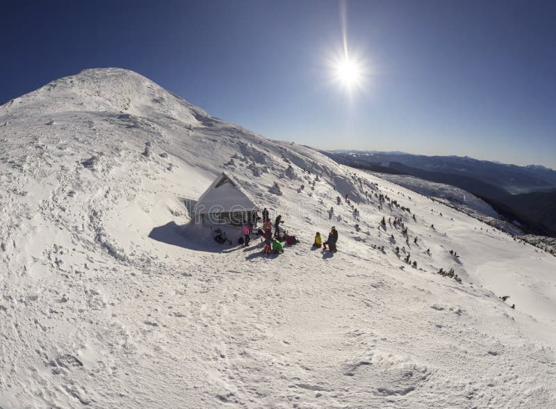 Ukraine, Vorokhta December 31, 2015: Close to the highest peak of Ukraine Goverla house shelter climbers, endearing it to the winter holiday of the New Year. Photos from the drone. Ukraine, Vorokhta December 31, 2015: Close to the highest peak of Ukraine Goverla house shelter climbers, endearing it to the winter holiday of the New Year. Photos from the drone.