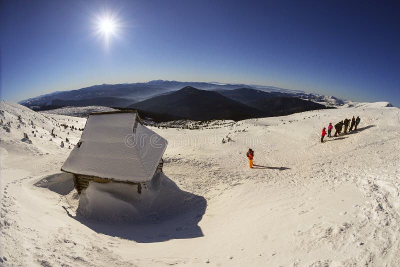 Ukraine, Vorokhta December 31, 2015: Close to the highest peak of Ukraine Goverla house shelter climbers, endearing it to the winter holiday of the New Year. Photos from the drone. Ukraine, Vorokhta December 31, 2015: Close to the highest peak of Ukraine Goverla house shelter climbers, endearing it to the winter holiday of the New Year. Photos from the drone.