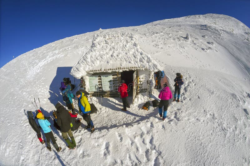 Ukraine, Vorokhta December 31, 2015: Close to the highest peak of Ukraine Goverla house shelter climbers, endearing it to the winter holiday of the New Year. Photos from the drone. Ukraine, Vorokhta December 31, 2015: Close to the highest peak of Ukraine Goverla house shelter climbers, endearing it to the winter holiday of the New Year. Photos from the drone.