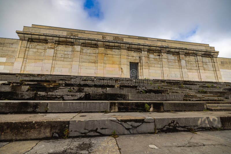 Nuremberg, Germany - October 25, 2023: The remains of German megalomania in the Third Reich, main tribune or great stand at the Zeppelin Field in Nuremberg. Hitler had his army deployed on the road