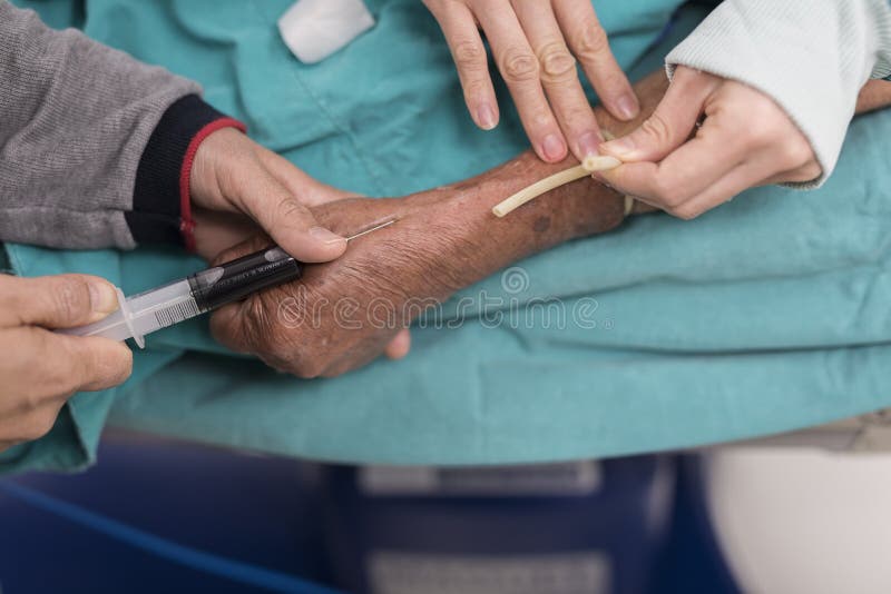 Nurse Drawing Blood from Patient Stock Image Image of needle asian