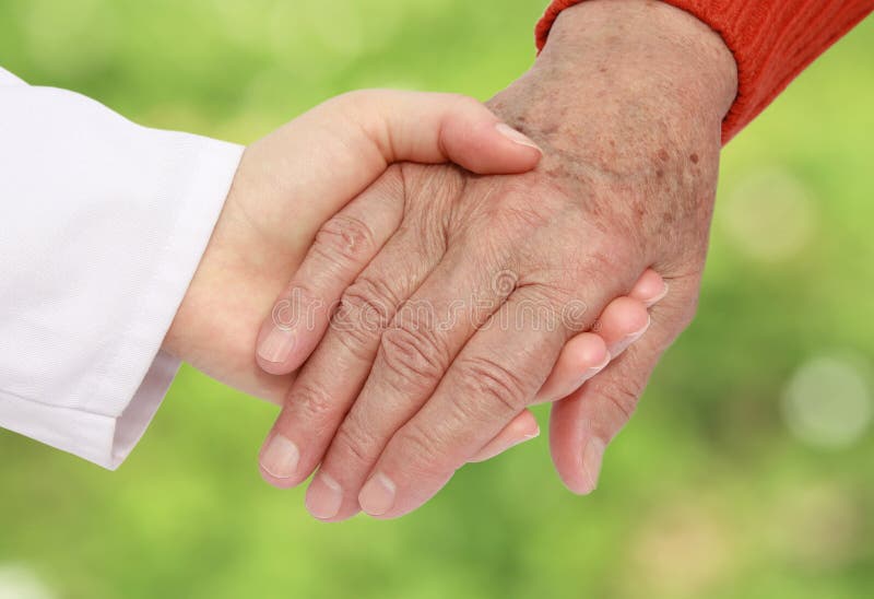 Nurse helping senior