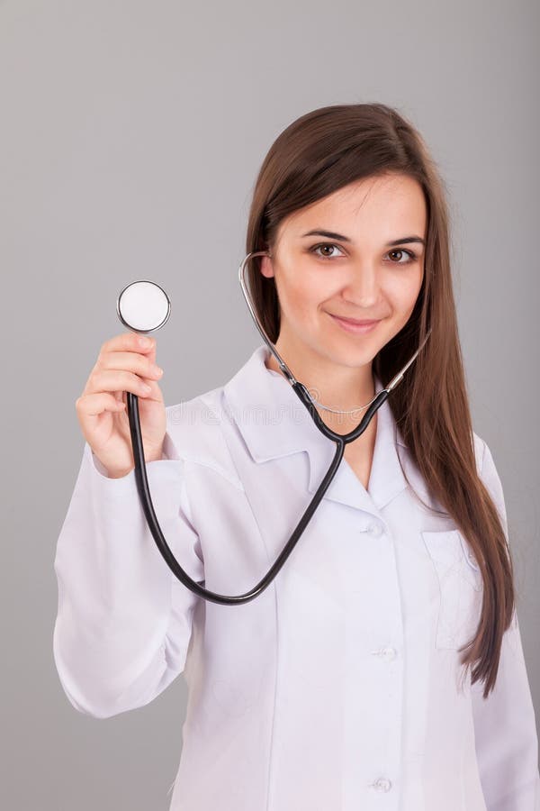 Nurse Holding Stethoscope stock image. Image of cute 39346761