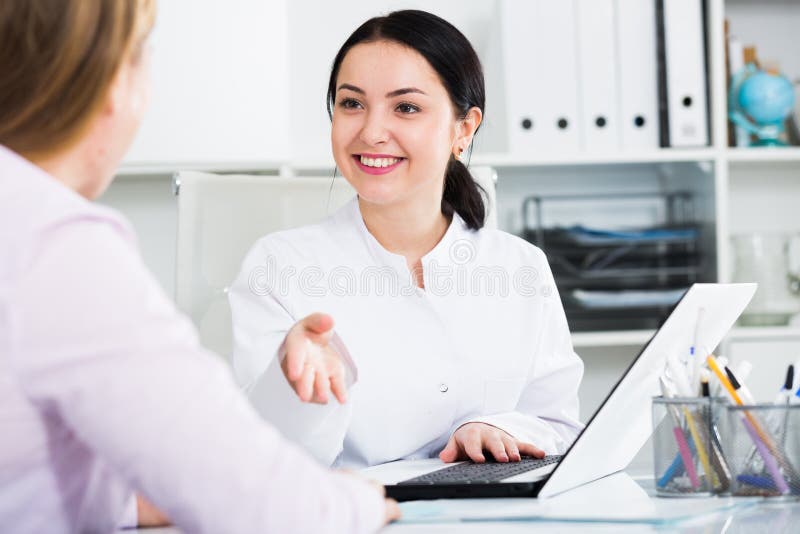 Nurse making appointment for client royalty free stock photography