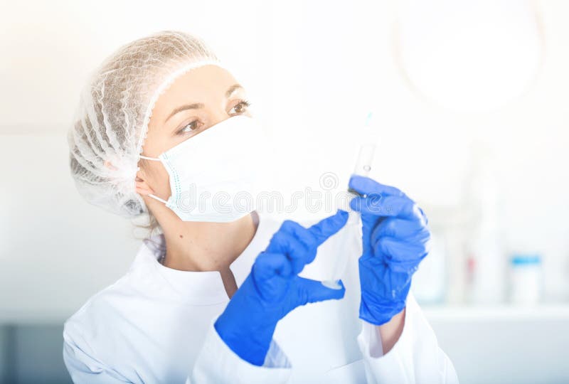 Nurse making injection stock photo