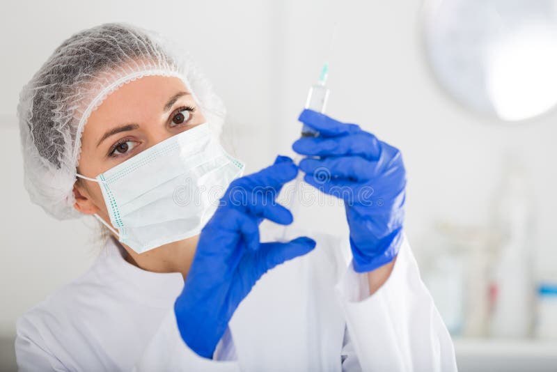 Nurse making injection royalty free stock images