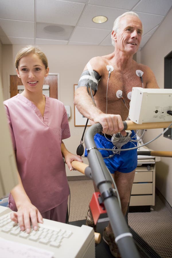 Nurse With Patient During Health Check stock images Nurse With Patient During Health Check stock images