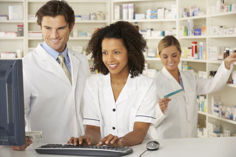 Nurse and pharmacists working in pharmacy