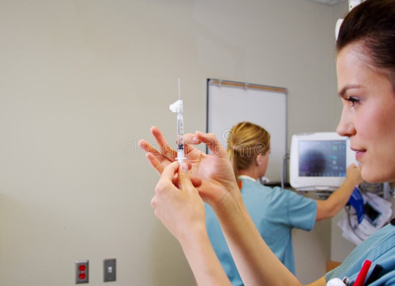Nurse preparing injection stock image. Image of professional 35054671