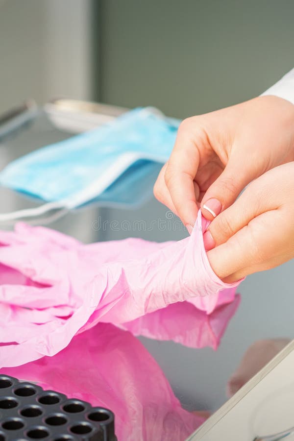 Nurse`s Hands Putting on Pink Gloves Stock Image Image of hospital