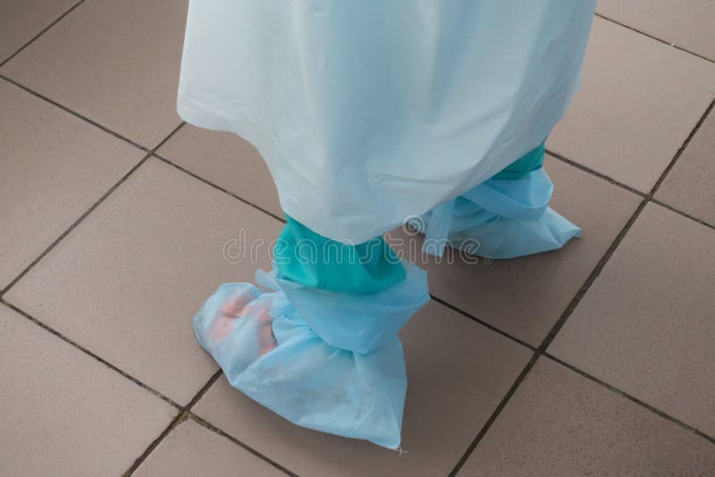 The Nurse is in Shoe Covers. Stock Photo Image of operating, footwear