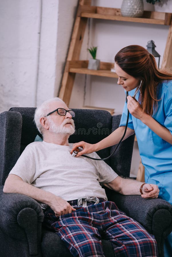 Nurse with Stethoscope Checking Heartbeat of Stock Photo Image of interior, heartrate 129305848