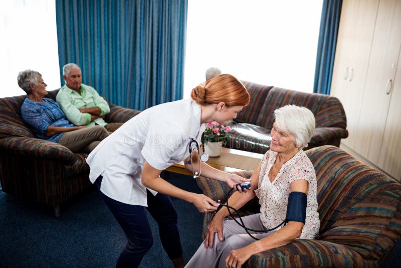 Nurse Taking Care of Pensioner Stock Image Image of adult, male 77846617