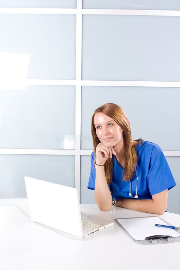 Nurse thinking in a modern office