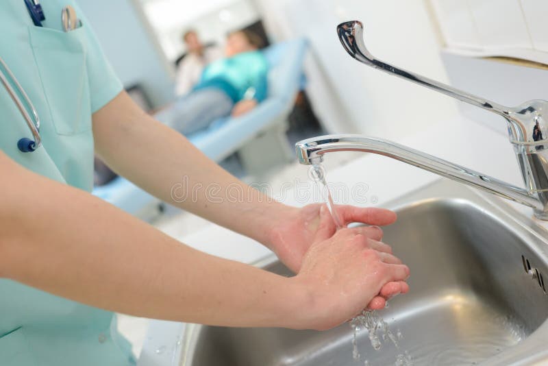 Nurse washing hands stock photo. Image of hands, clean 264499914