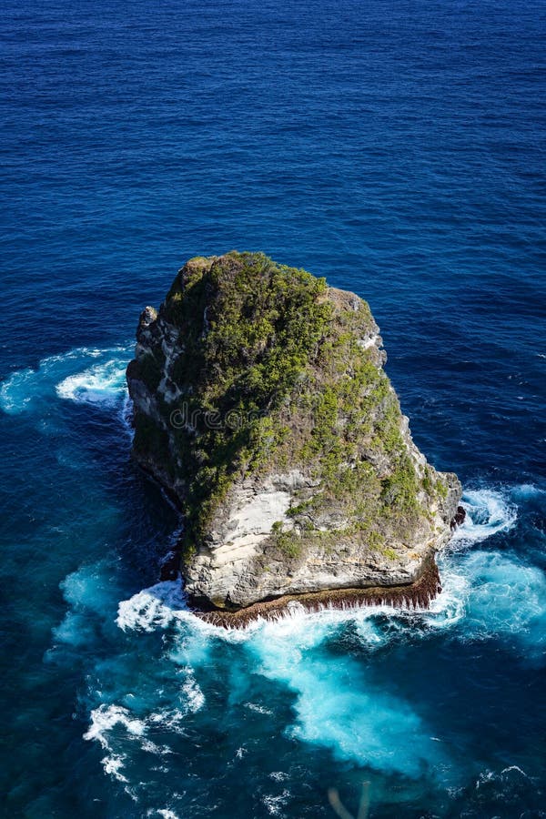 Nusa Banah Island at Nusa Penida, Bali - Indonesia. Small Triangle Shape Island
