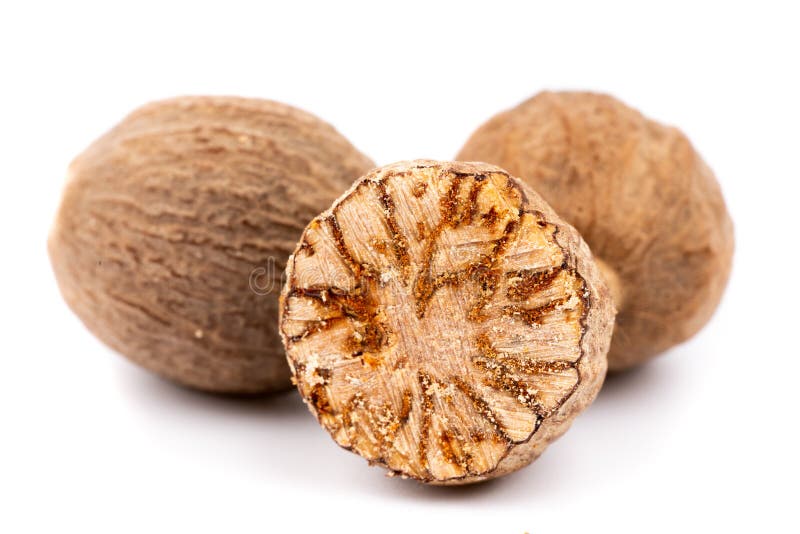 Nutmeg on white background stock image. Image of nature 143736947