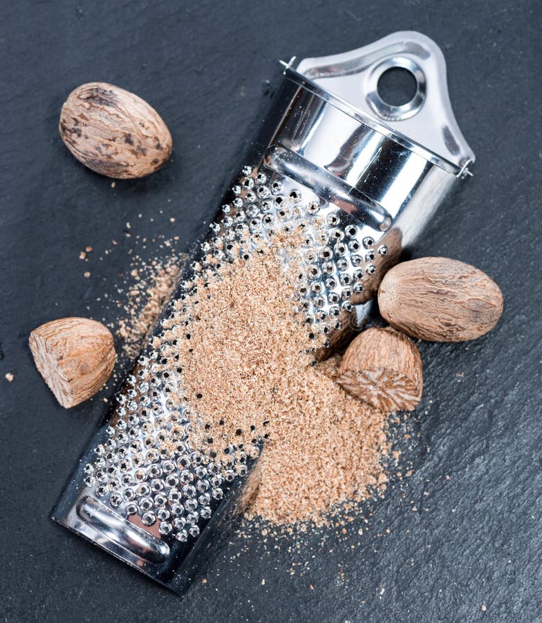 Nutmegs (fresh grated) stock image. Image of gourmet 40123915