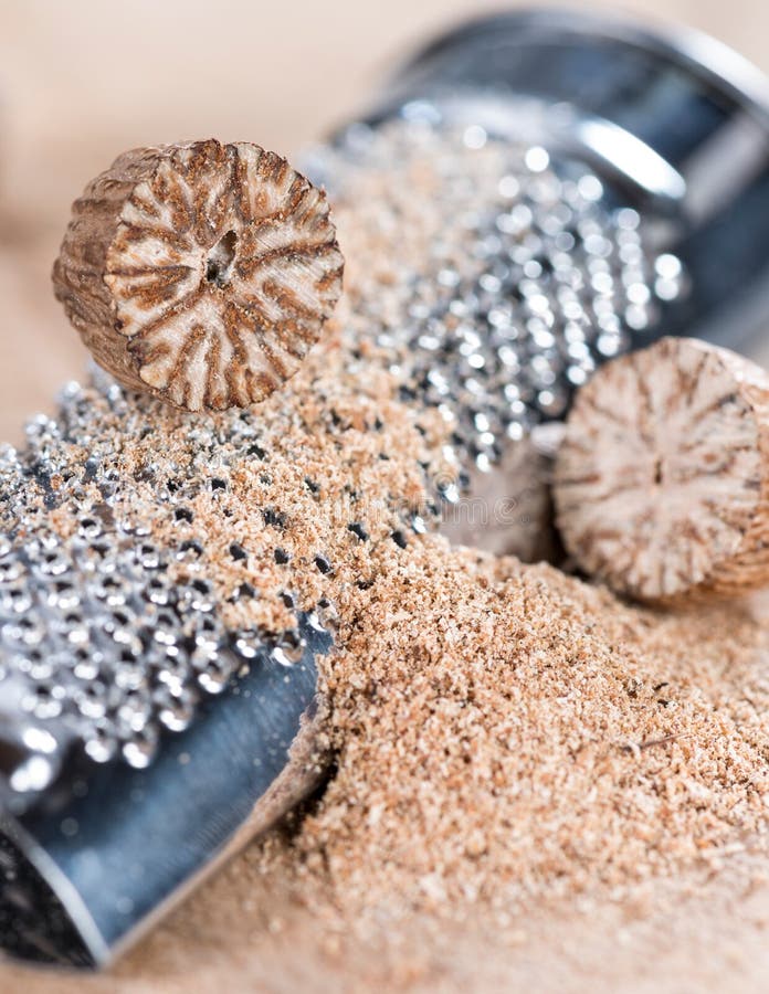 Nutmegs (fresh grated) stock image. Image of ingredient 39568277