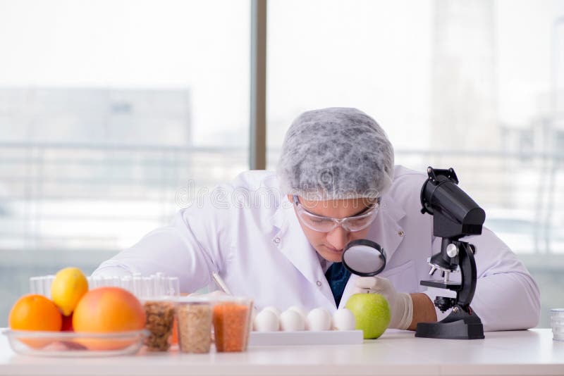 The nutrition expert testing food products in lab. Modified, chemistry.