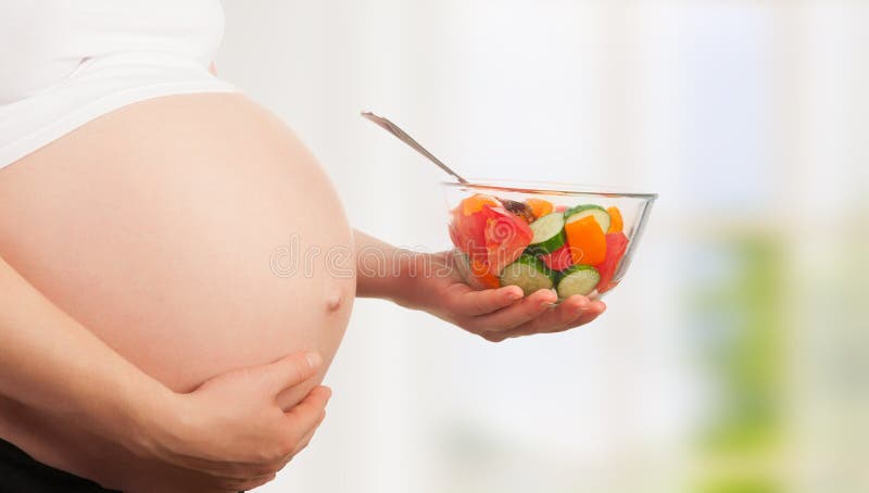 Nutrizione e gravidanza sane. immagine stock Nutrizione e gravidanza sane. immagine stock