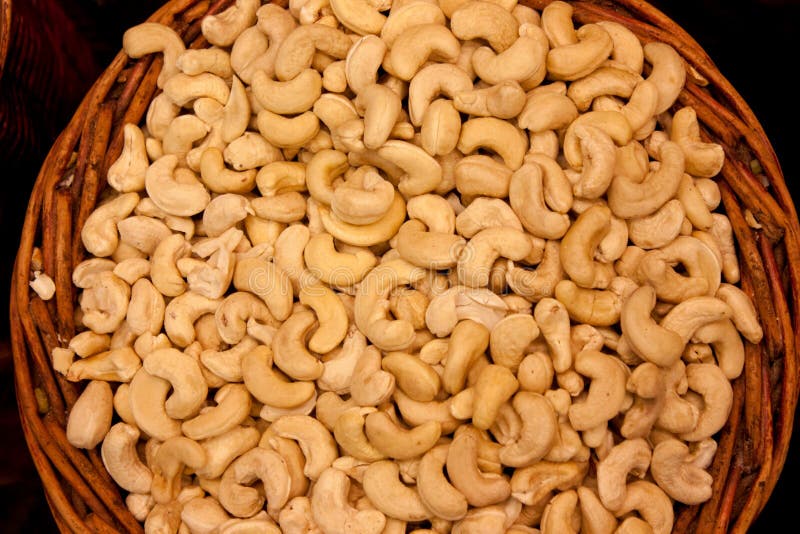 Texture of the cashew. There are many nuts in wattled basket