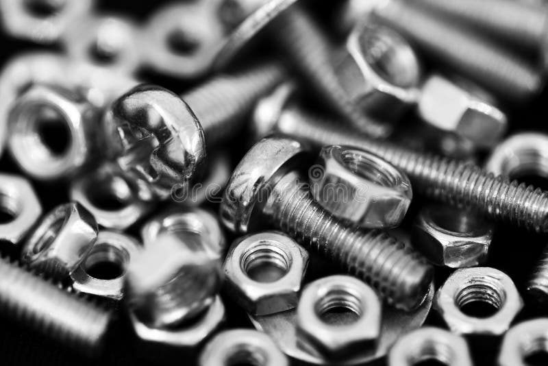 Nuts and Bolts Closeup stock photo. Image of screws 135566450