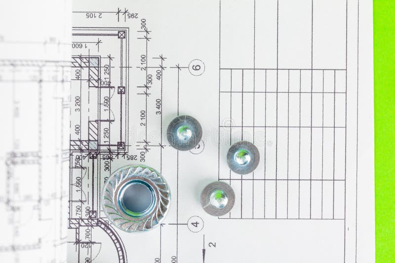 Nuts and Bolts Closeup Over House Plan Stock Photo Image of