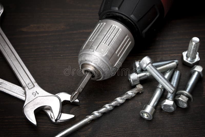 Nuts, bolts and tools stock photo. Image of mechanical 46632848