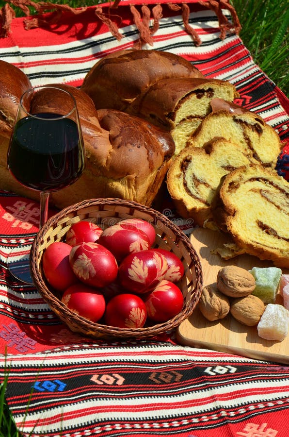 Nuts filling pound cake and red eggs for Easter