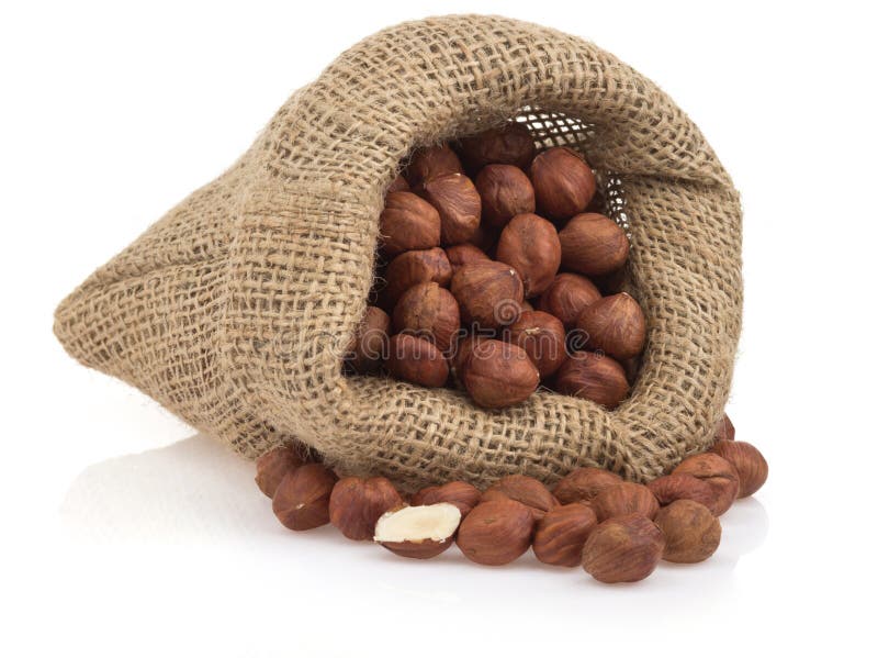 Nuts hazelnut in sack bag on white background.
