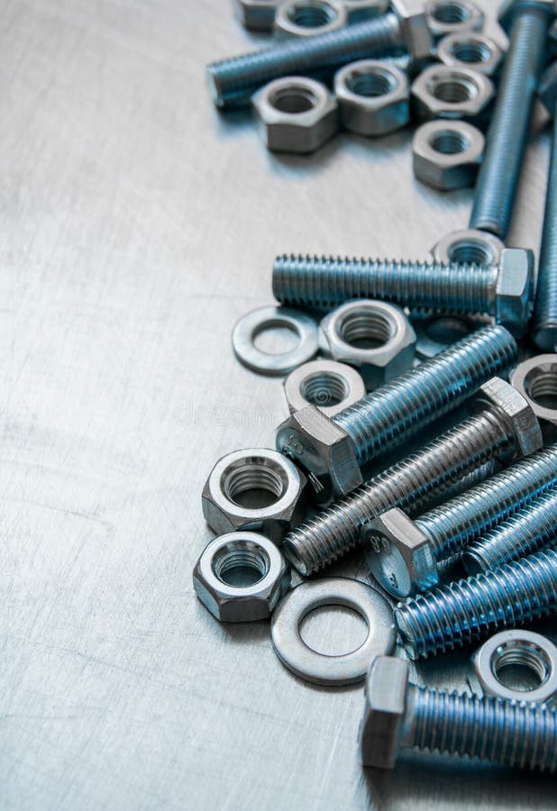 Nuts, Washers And Bolts On Scratched Metal Stock Image Image of equipment, bolt 51537121