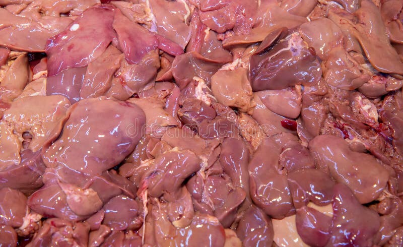 Ny grisköttnjuremarknad, Closeup av nytt njuregriskött som säljer i marknad Fega levrar Fega levrar för försäljning i ny marknad arkivfoto Ny grisköttnjuremarknad, Closeup av nytt njuregriskött som säljer i marknad Fega levrar Fega levrar för försäljning i ny marknad arkivfoto