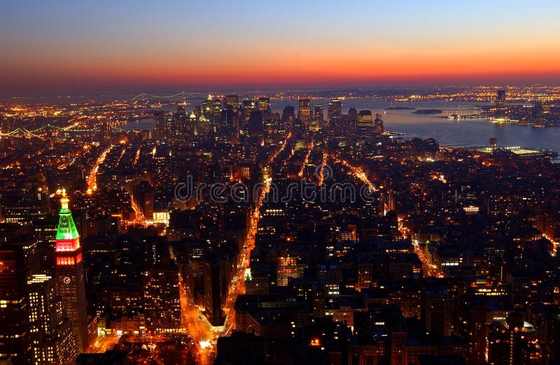 The Night view of downtown Manhattan, New York from the top of the Empire State Building. The Night view of downtown Manhattan, New York from the top of the Empire State Building