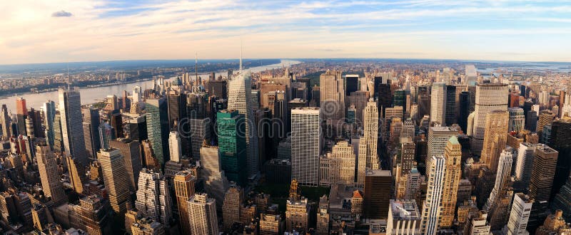 New York City Manhattan aerial panorama view with New Jersey from west Hudson River and skyscrapers at sunset. New York City Manhattan aerial panorama view with New Jersey from west Hudson River and skyscrapers at sunset.