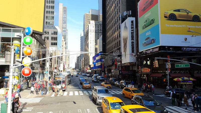 POV of Times Square. Is featured with Broadway Theaters and LED signs as a symbol of New York City and the USA, N