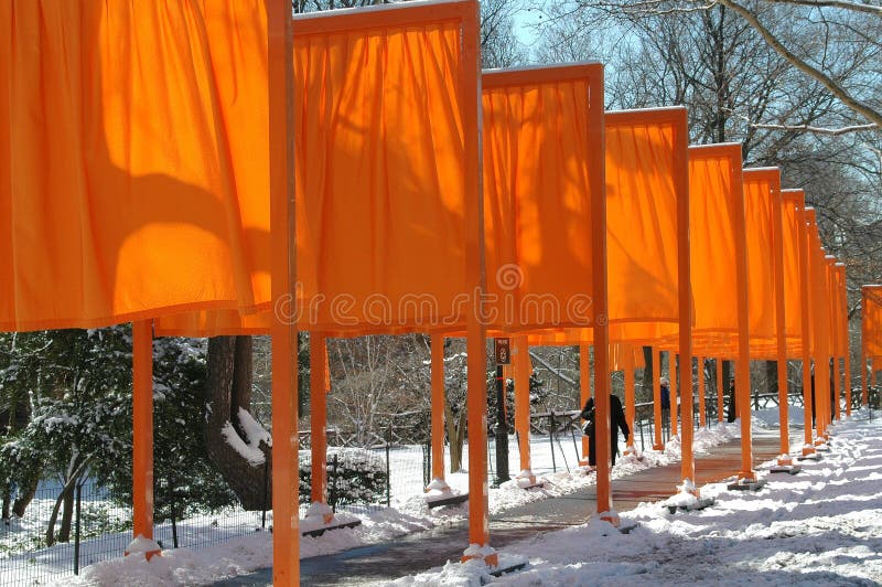 Famed artist Christo's landmarked art installation entitled The Gates lines a pathway in a snowy Central Park in NYC. Famed artist Christo's landmarked art installation entitled The Gates lines a pathway in a snowy Central Park in NYC.