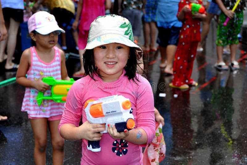 NYC: Little Girl with Water Gun stock image