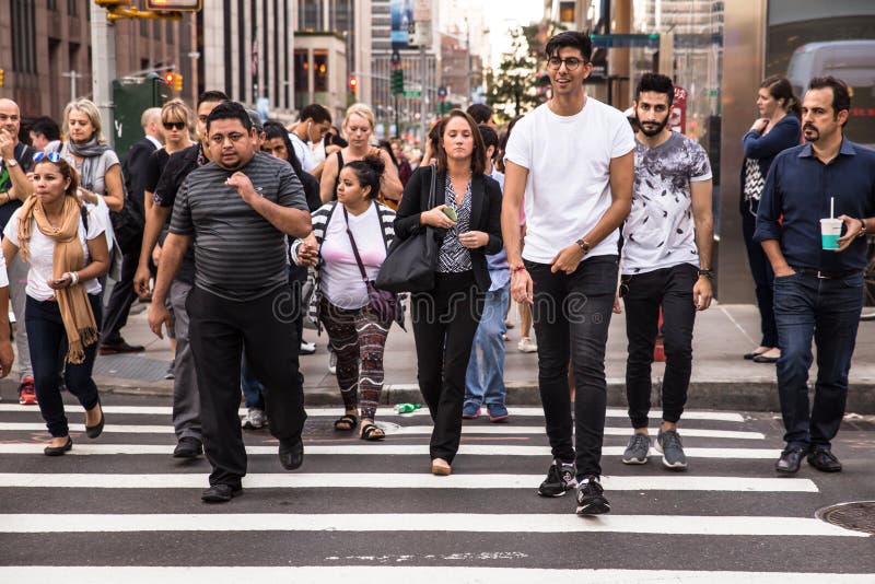 nyc-pedestrians-new-york-city-september-pictured-here-crosswalk-midtown-manhattan-diversity-crossing-60330945.jpg