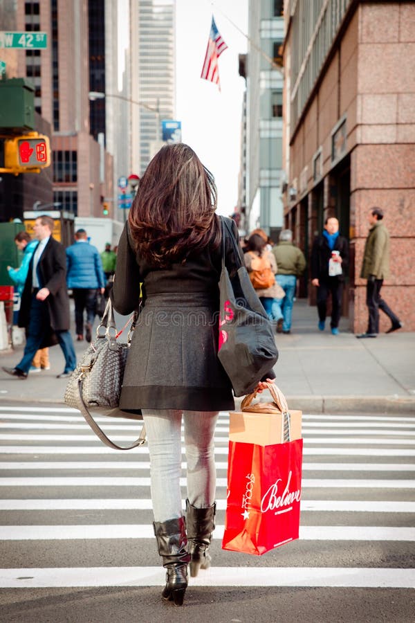 NYC Shopper with Macys Bag editorial photo. Image of beautiful - 63547446