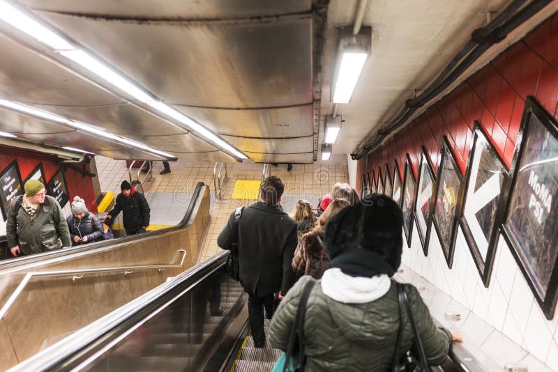 NYC/USA 02 JAN 2018 - people going down the stairs of the New York subway. royalty free stock photography NYC/USA 02 JAN 2018 - people going down the stairs of the New York subway. royalty free stock photography
