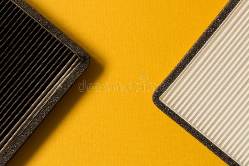 Nytt och gammalt billuftfilter close upp arkivfoto Nytt och gammalt billuftfilter close upp arkivfoto