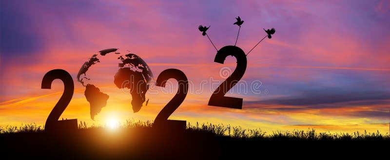 Silhouette 2022 years in sunset background. Birds carrying number 2 while celebrating 2022 years. Happy New Year and Merry Christmas. Copy space. Silhouette 2022 years in sunset background. Birds carrying number 2 while celebrating 2022 years. Happy New Year and Merry Christmas. Copy space.