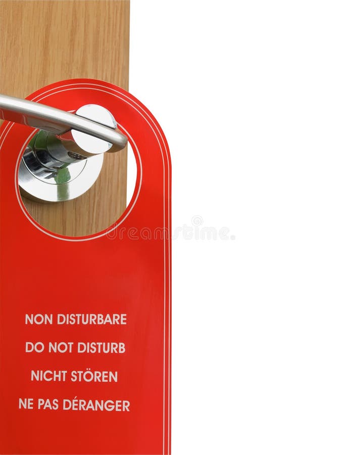 Não perturbe o sinal que pendura no punho de porta fotos de stock Não perturbe o sinal que pendura no punho de porta fotos de stock