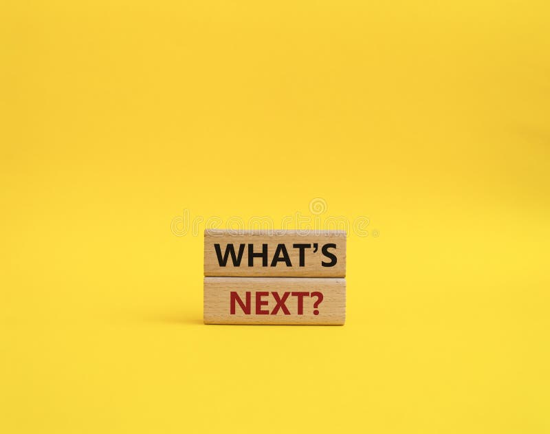 What is next symbol. Concept word What is next on wooden blocks. Beautiful orange background. Business and What is next concept. Copy space. What is next symbol. Concept word What is next on wooden blocks. Beautiful orange background. Business and What is next concept. Copy space